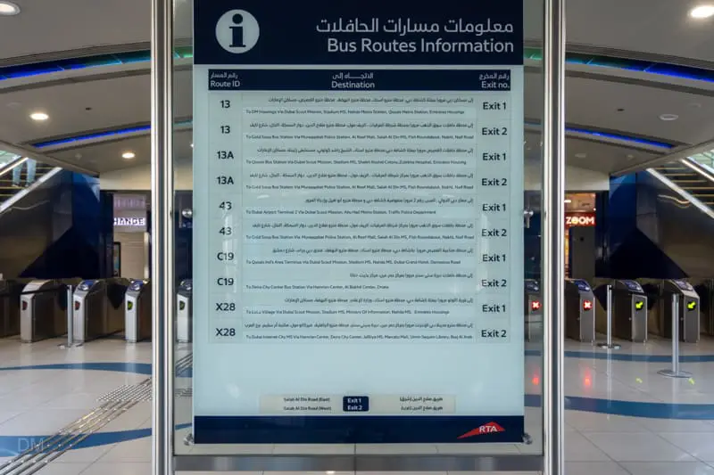 Sign at Abu Baker Al Siddique Metro Station showing bus services