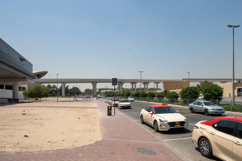 Taxis at Etisalat Bus Station and view of Etisalat Metro Station