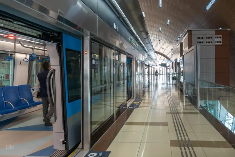 Train at platform at Creek Metro Station in Dubai.