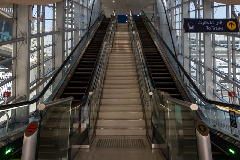 Escalators and stairs to concourse of Emirates Metro Station