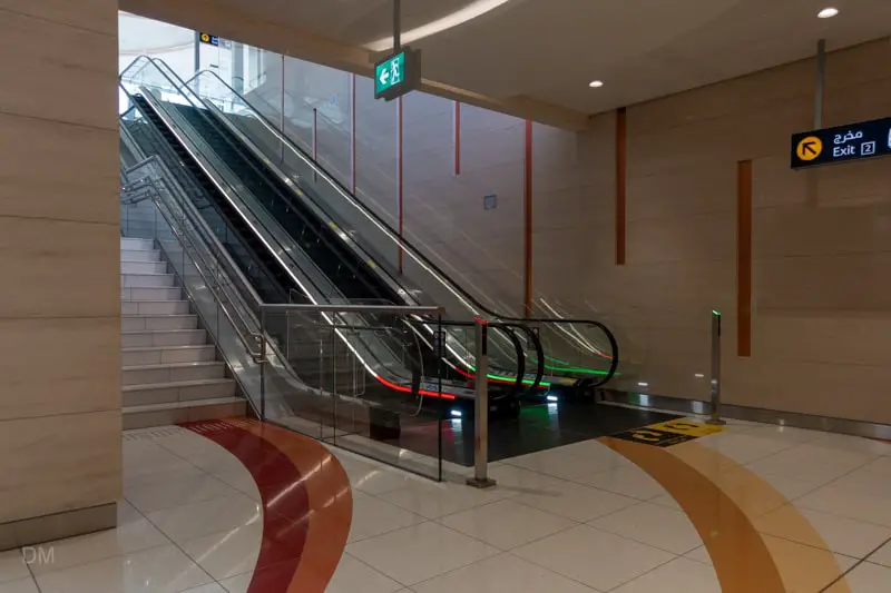 Stairs and escalators to platform at Jumeirah Golf Estates Metro Station