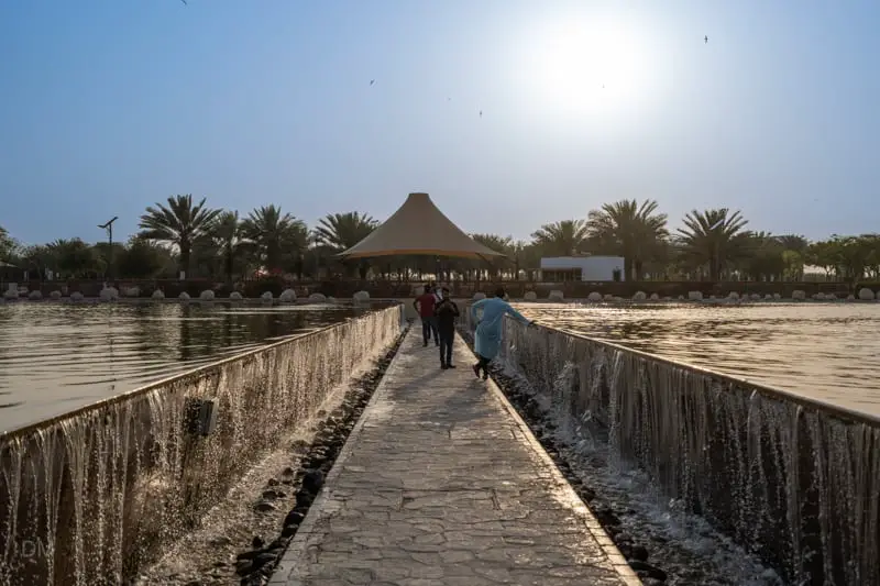 Walkway through the lake at Quranic Park