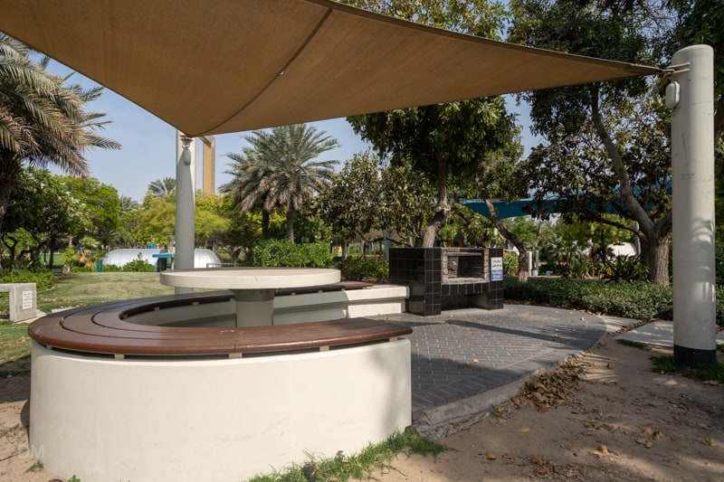 Barbecue (BBQ) area with seating at Zabeel Park in Dubai