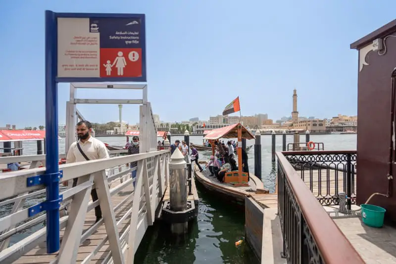 Passengers alighting from an abra at Deira Old Souk Abra Station